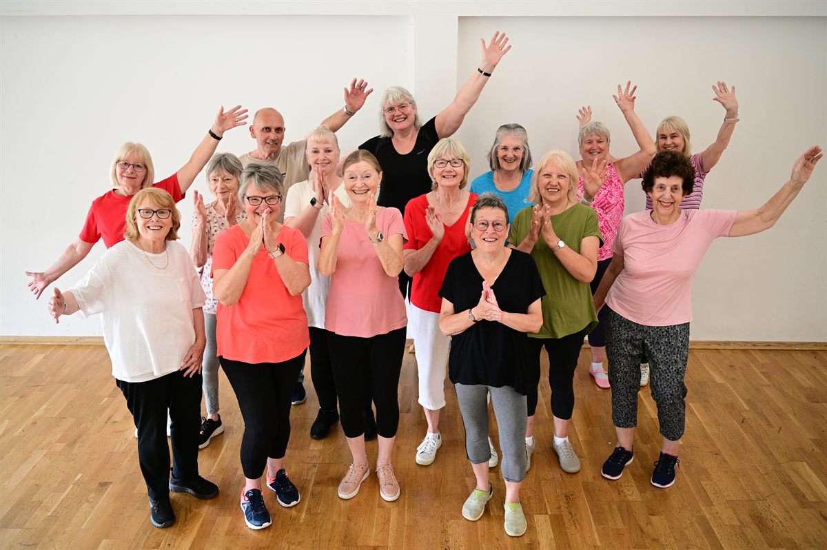 Members of a Timeless Together Fitness class exercising together